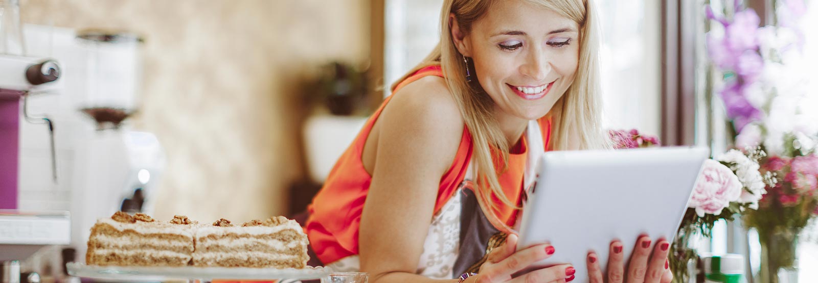 Business owner using tablet in shop